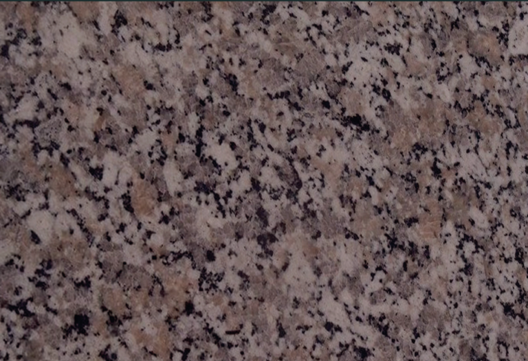 Qusair Egyptian granite surface with mixed pink, grey and black grain