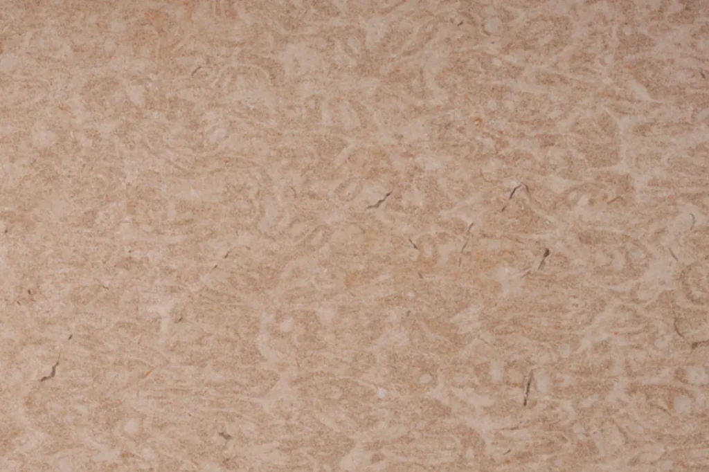 Galala Extra marble brushed-finish catalogue sample: warm pink-beige with a mottled pattern.