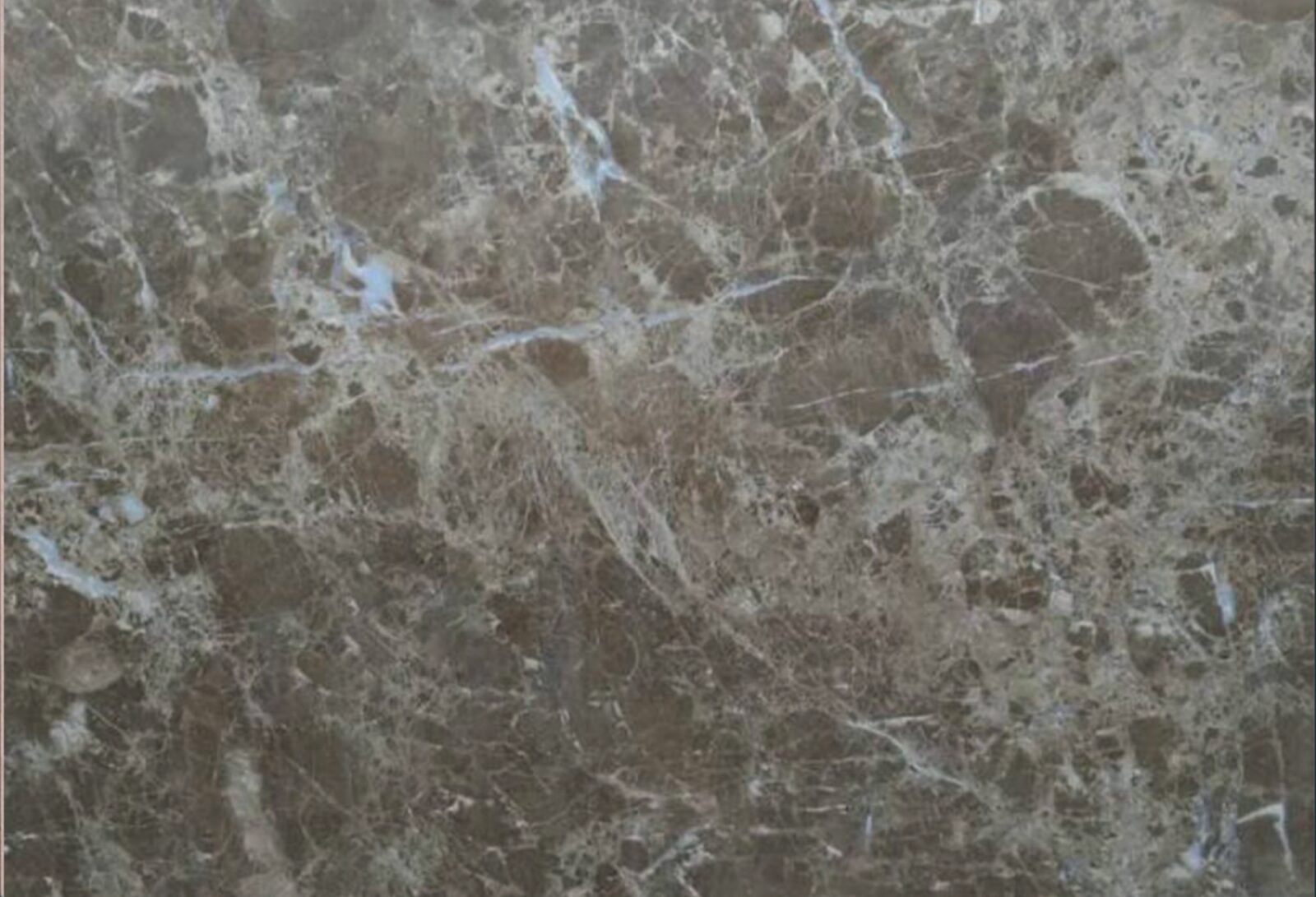 Polished Emperador Egyptian marble surface with natural veining